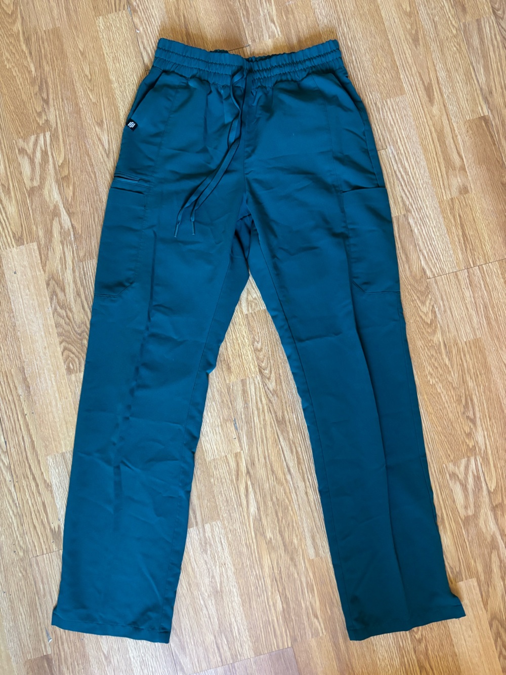 Jaanuu high waisted scrub pant in teal color Size small